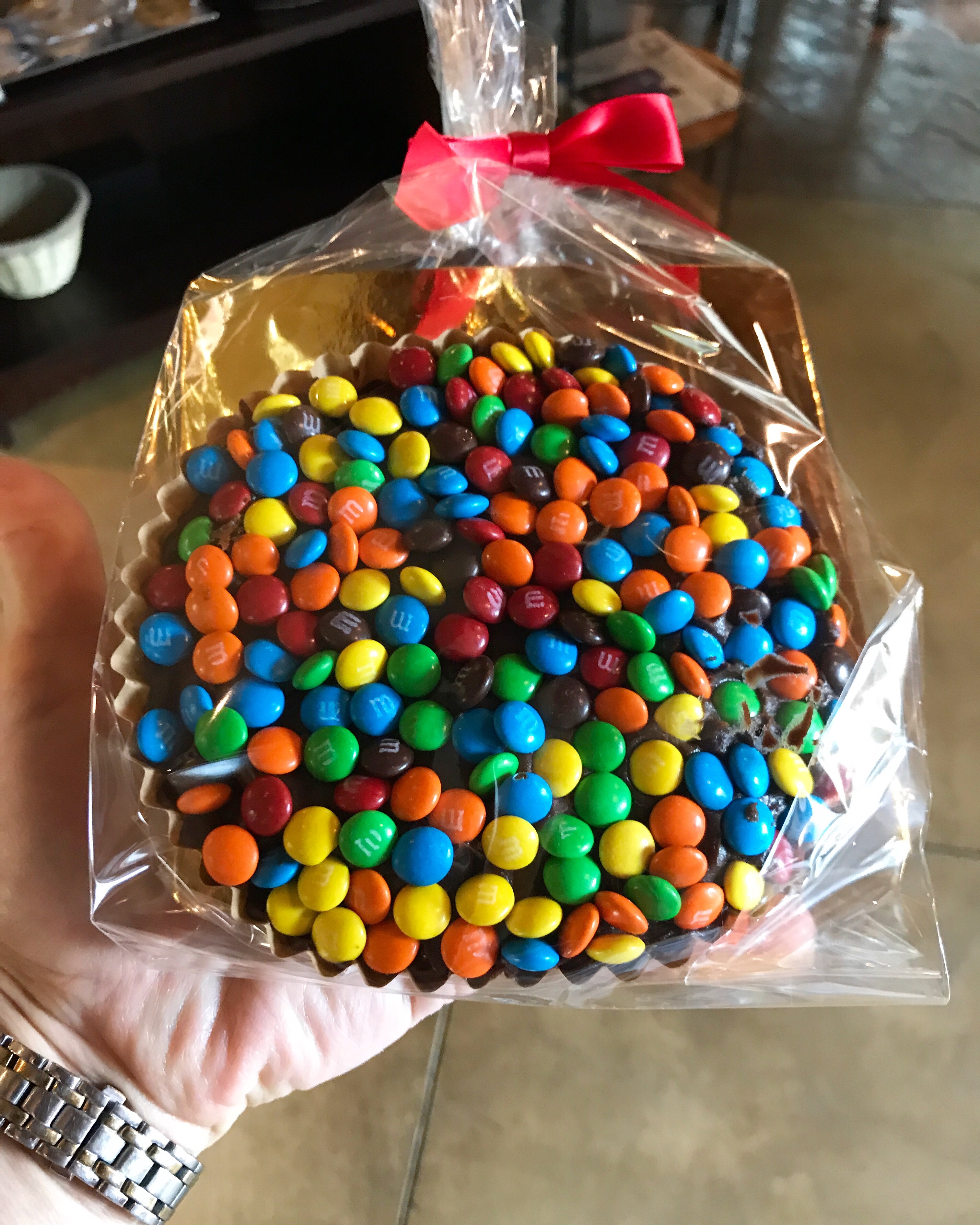 Need a giant m&m brownie covered in m&ms? Just as big as the peanut butter  one! About an inch to 1 - Disneyland Lounge